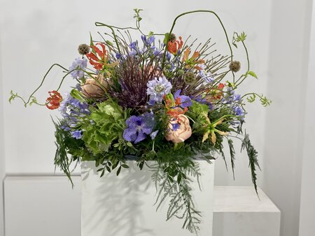 Rouwarrangement pastel