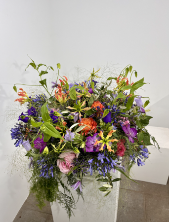 Rouwarrangement kleurrijk